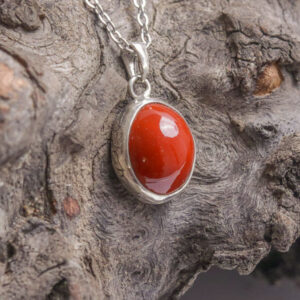 Red Jasper Oval Cabochon Pendant – Engraved Leaf Border