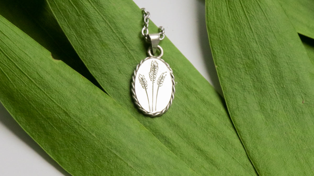 Engraved Wheat Oval Pendant – Twist Wire Border