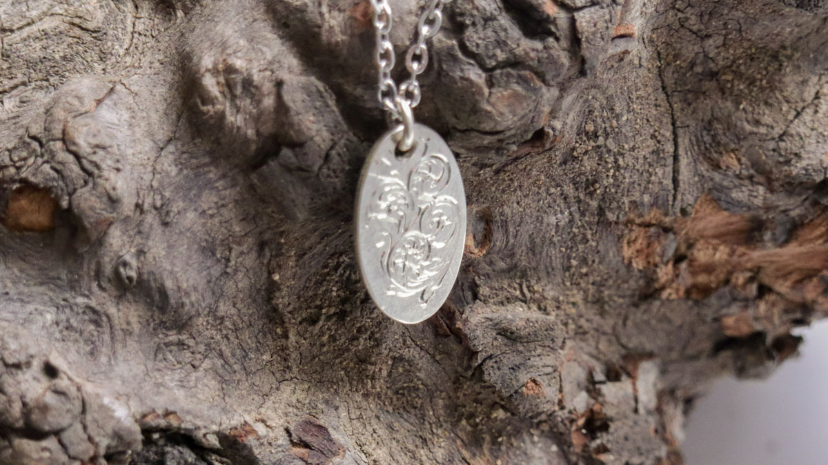 Engraved Scrollwork Oval Silver Pendant