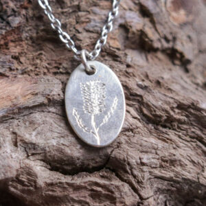 Engraved Banksia Oval Silver Pendant